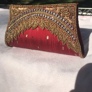 Silk, beaded rhinestone clutch with beaded handle 7”long